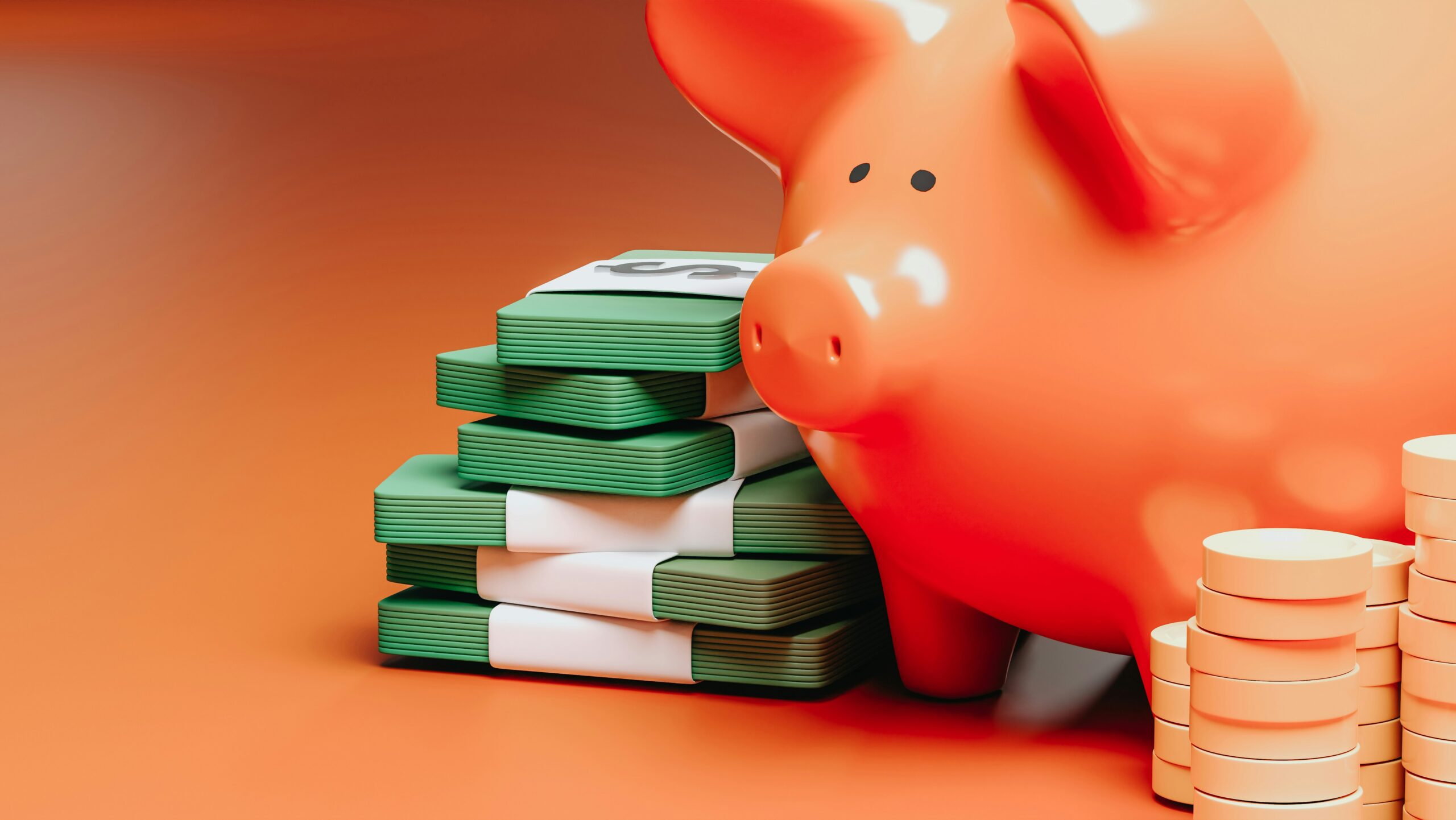 Piggy bank with notes sitting beside it